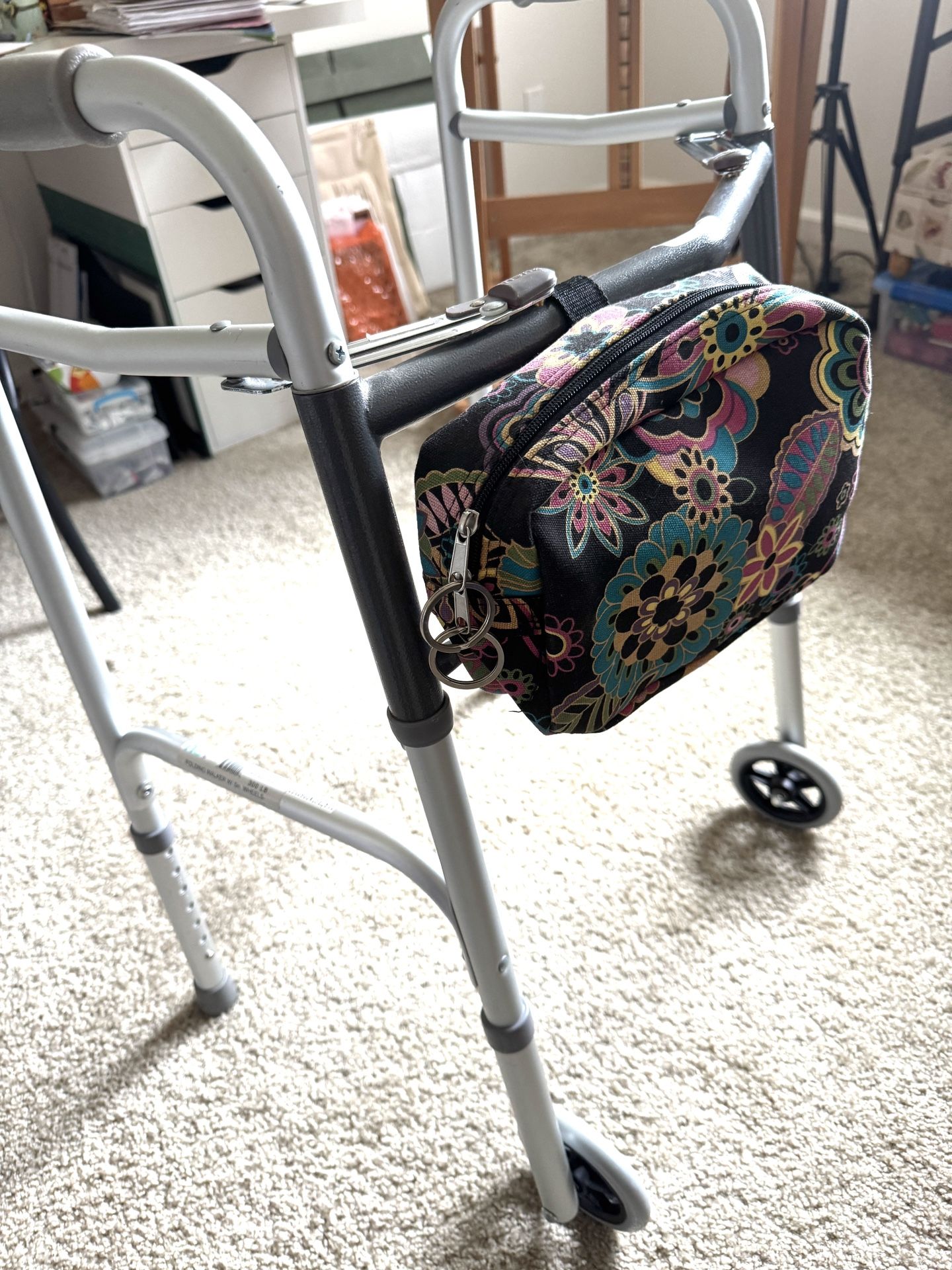 Walker-Foldable, adjustable height.