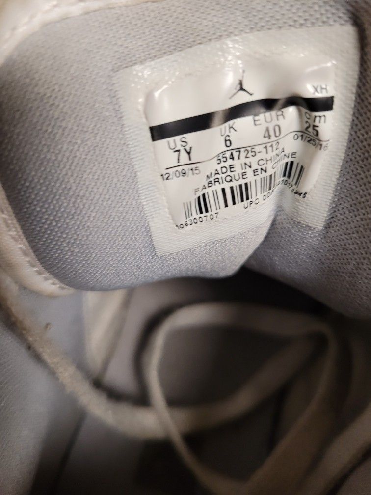 White Nike Air Jordan 1s