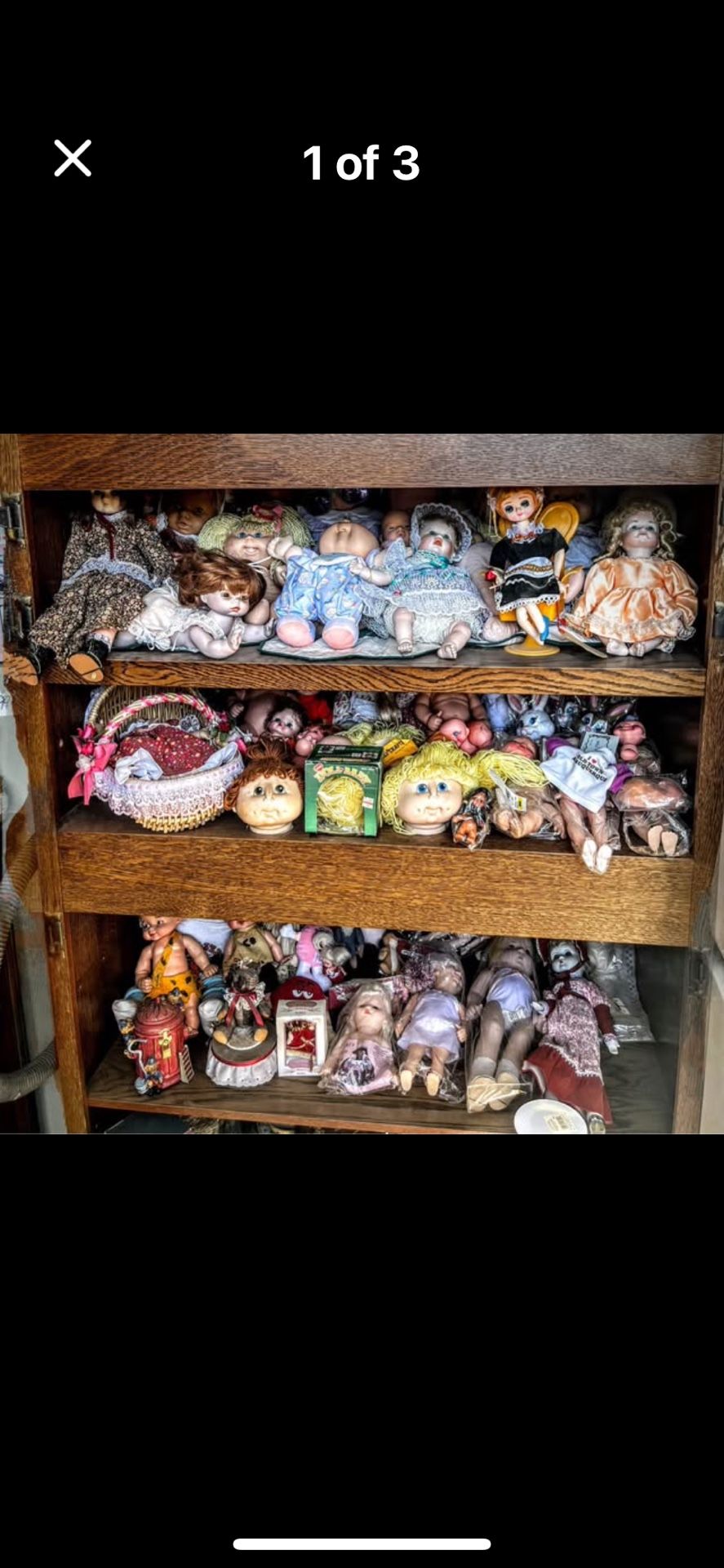 Three entire deep Shelves Filled with Dolls, Doll parts and accessories