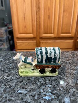 Vintage Ceramic Donkey Pulling Covered Wagon Pair of Salt and Pepper Shakers.  Preowned with original cork stoppers.  Made in Japan stamped on the bot