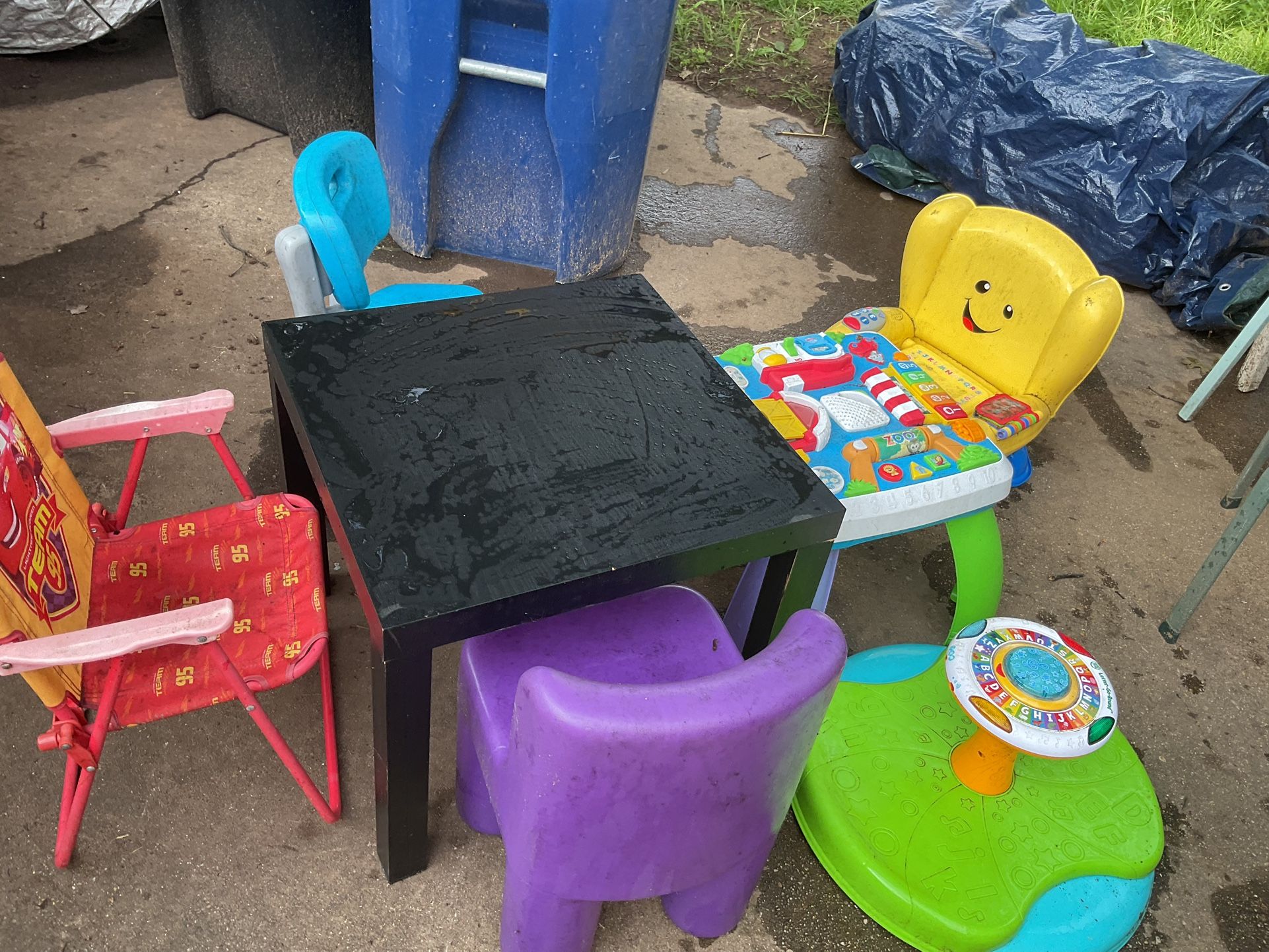 An IKEA Black Children Table With Chairs And Some Disney Items (NO SHIPPING)