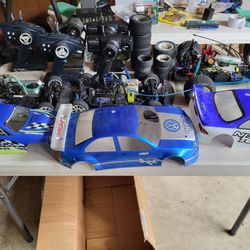 3 Remote Control Fuel Powered Cars. 5 Controllers And Extra Wheels   Untested Selling As Parts