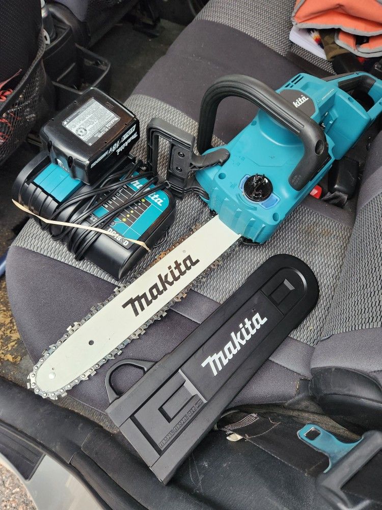 makita chainsaw battery n charger 