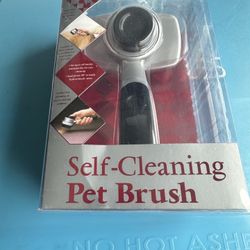 Brand New Self Cleaning Pet Brush 