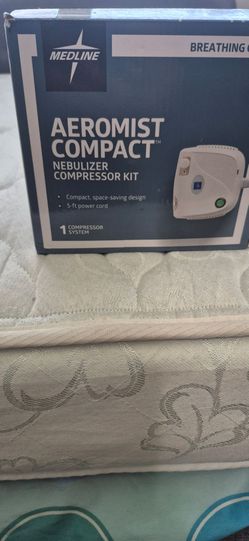 Nebulizer with two hoses and mouthpieces