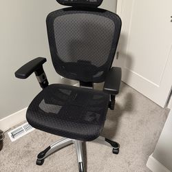 Reclinable, height adjustable office chair (Staples Hyken)