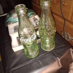 Antique Coca Cola Bottles.