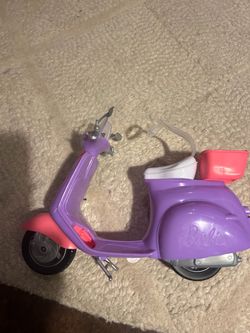 Barbie scooter and Barbie dolls