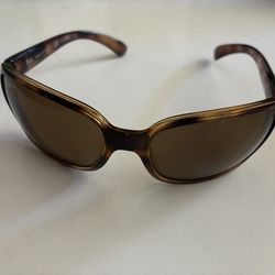 These are Ray-Ban RB4068 Havana sunglasses with brown polarized lenses.