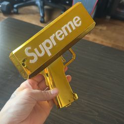 Gold Supreme Money Gun