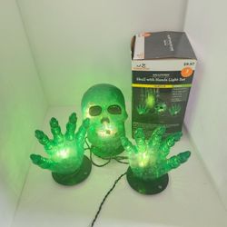 Halloween 3 piece indoor/outdoor skull with hands light set.