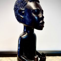 Original hand carved hard wood African sculpture with dimensions H10xW3 inch Lbs 1.95. Original African art in excellent vintage condition  Item# 201G