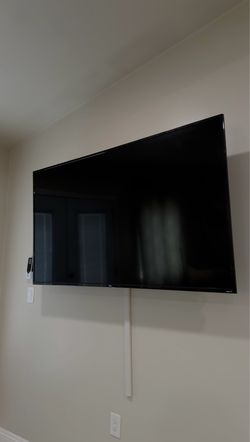65-inch 4-Series 4K UHD LED TV TCL built-in Roku