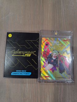 Cyberpunk TCG Embracing power deck and Rebecca promo card from Anime Expo 2026