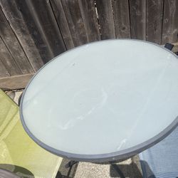 Foldable Glass /metal table. 