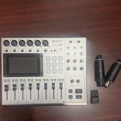 Zoom PodTrak P8 Podcast Recorder with Added Accessories $1 