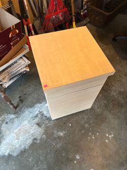 Versatile Light Wood Tone Storage Cabinet