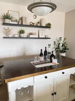 Like new bar with two stools-great quality from Costco