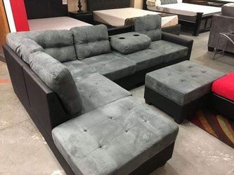 BRAND NEW REVERSIBLE SECTIONAL SOFA WITH DROP DOWN TABLE AND STORAGE OTTOMAN