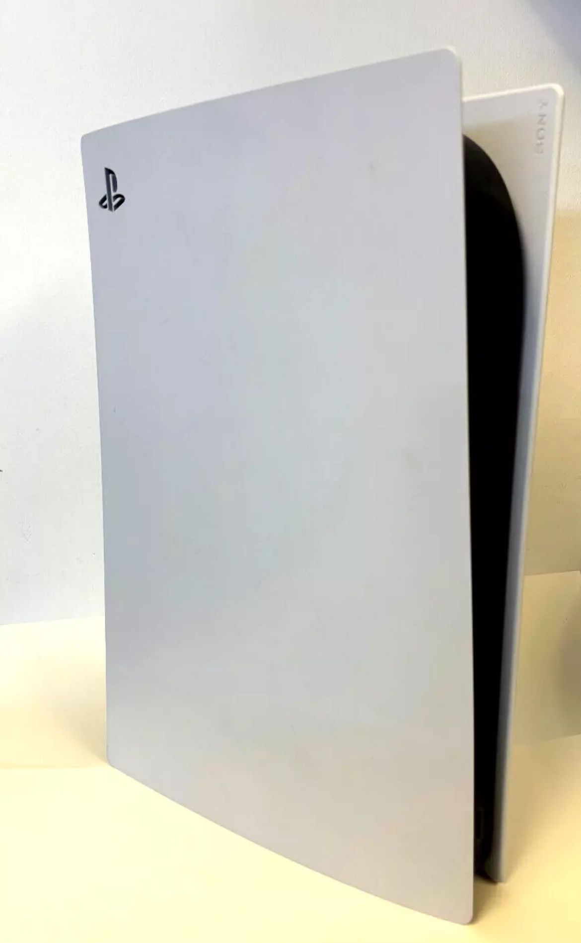 PlayStation five digital version with two controllers