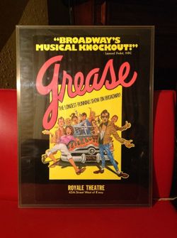 Framed vintage grease poster