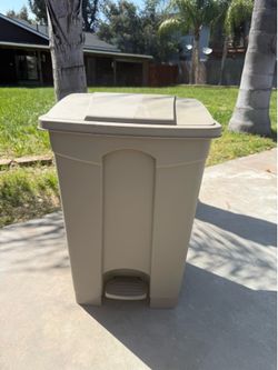 Beige trash can