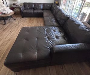 Macy’s three-piece, large leather sectional