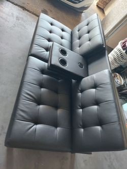 Black Faux Leather Futon Sofa with Cup Holders