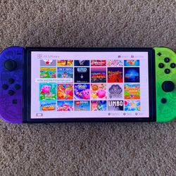 NINTENDO SWITCH OLED with 125 SWITCH GAMES INCLUDED