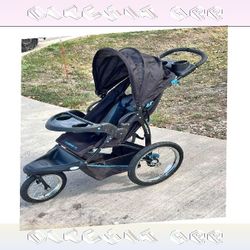 Children's Buggy Protected and Stylish for Today's Families authority stock