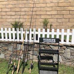 Five (5) Daiwa Fishing Rods With Daiwa Reels Plus A 16 Fishing Rod Rack.