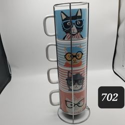 Stack Of Cat Coffee Mugs And Rack