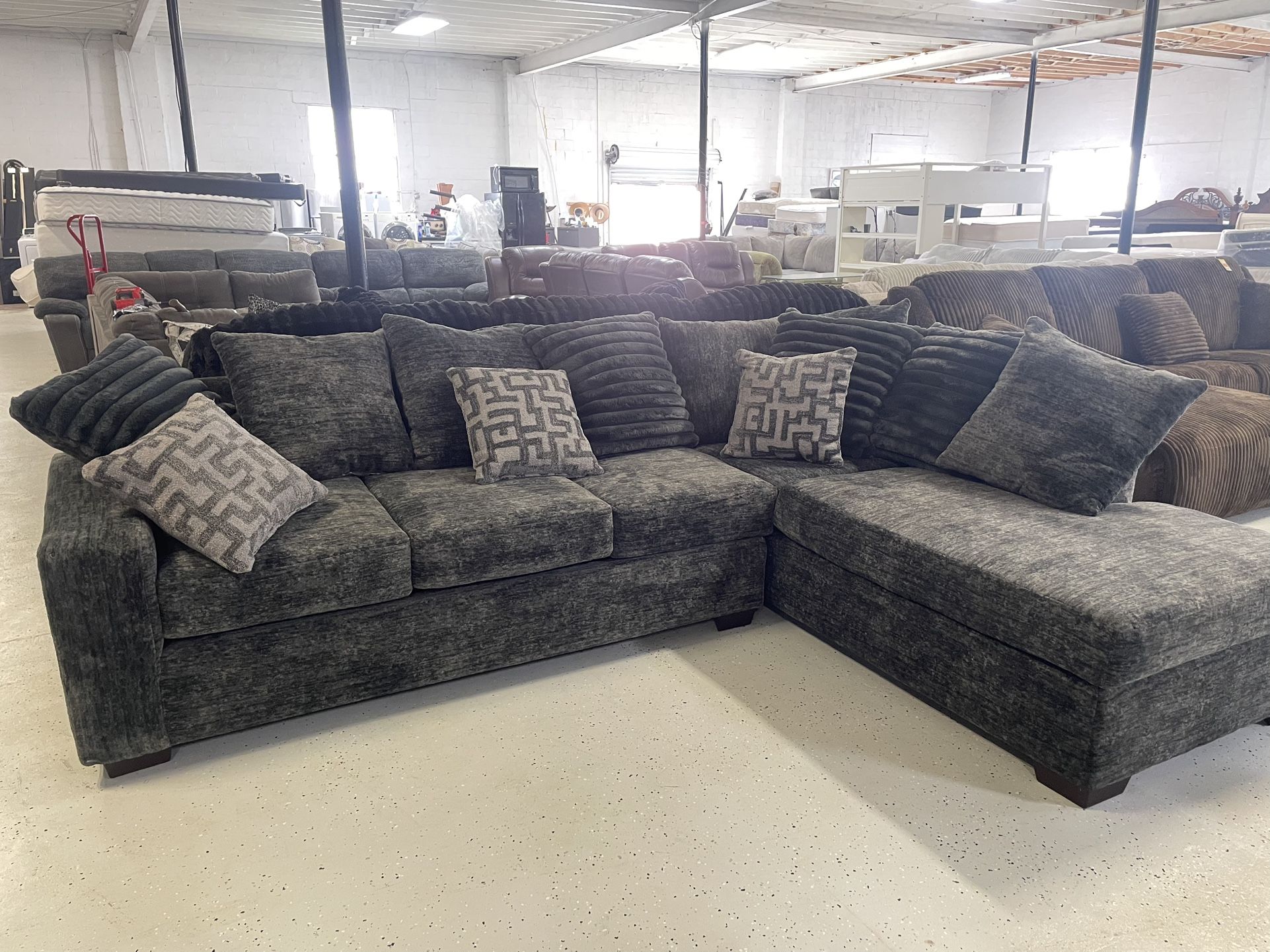 New sectional 118” by 88” $1299