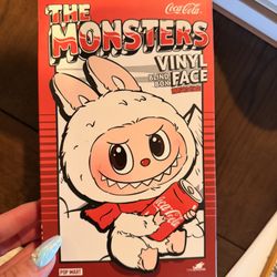 Two Coca Cola Brand Labubus