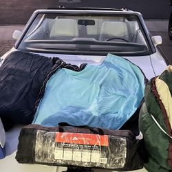 Camping Bundle – 2 Sleeping Bags + 4-Person Ozark Trail Tent + Ice Chest.  $80