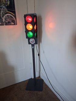 Four foot tall metal , stand plastic traffic light