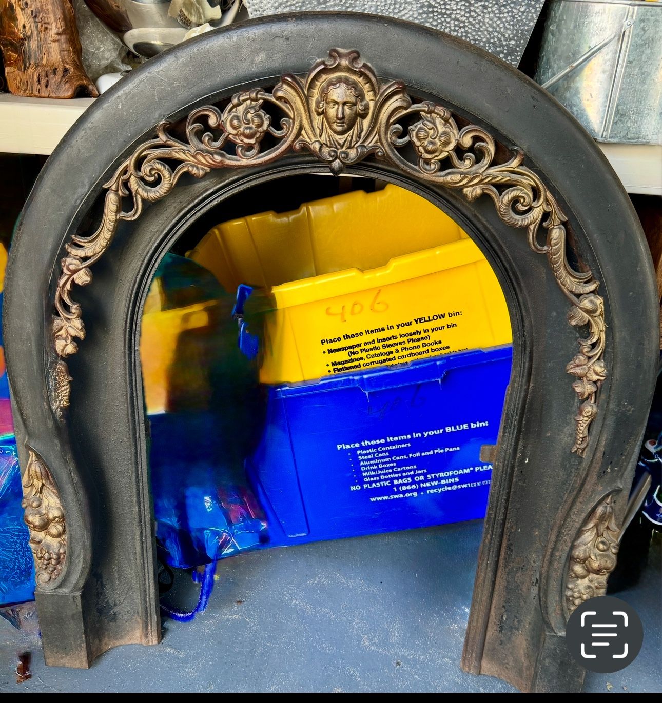 Antique, ornate cast iron Fireplace Surround