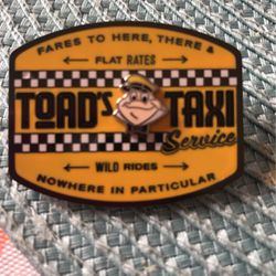 Go to taxi service lapel pin from Disney
