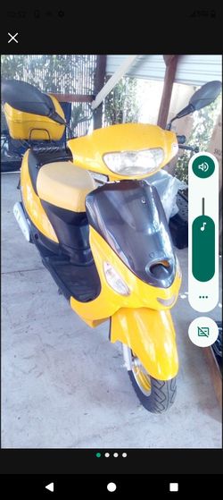 2012 Sunny 50cc.   Only 1kmiles On It!