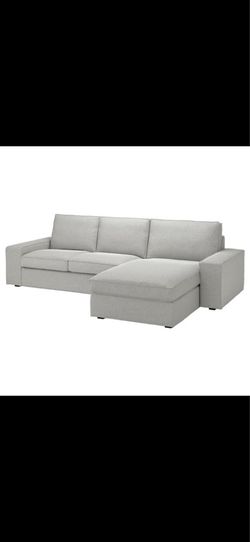 Kivik 4 seat sofa with chaise. Light gay