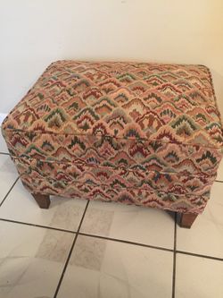 Ottoman with extra cover/seat