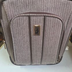 Small portable travel bag from London Vogue, almost new, clean and sanitized