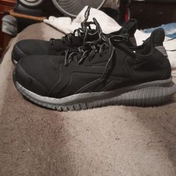 Reebok Steel Toe Shoes.  Men's 7. Women's 9.  Like New