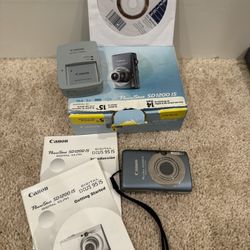 Canon PowerShot SD1200 IS Digital Camera is a 10.0-megapixel in boxwith charger 