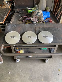 3 Ford Mustang Center caps.