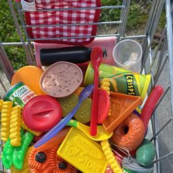Kids Pushing Cart And Fruits With A Basquet 