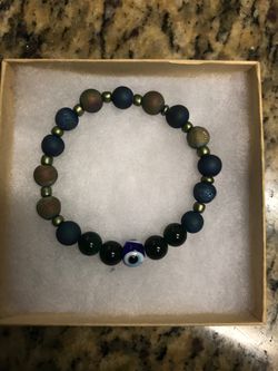 Titanium stone with African jade and evil eye protection stretch bracelet. Size 7.5 inches