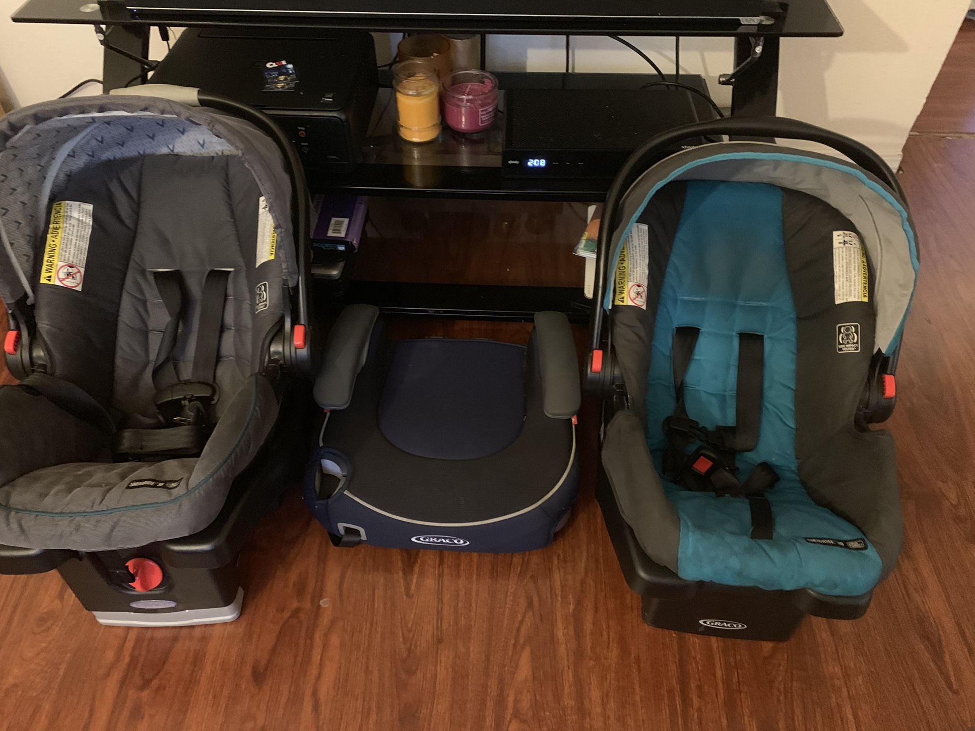Graco 2 infant car seats and one booster seat