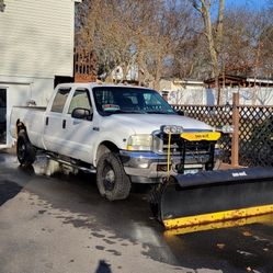 2002 Ford F 250 WITH PLOW
