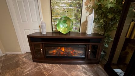 Beautiful fireplace /tv stand with bluetooth speakers  70” inches long